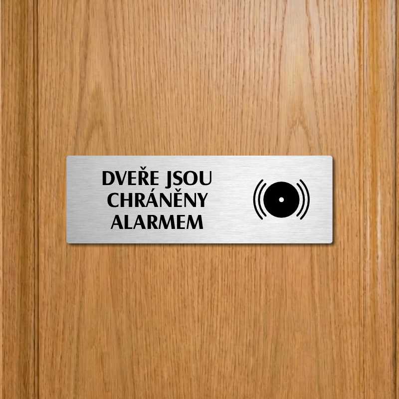Dveře pod alarmem, 240x79mm, stříbrná popiska s ozdobou uprostřed